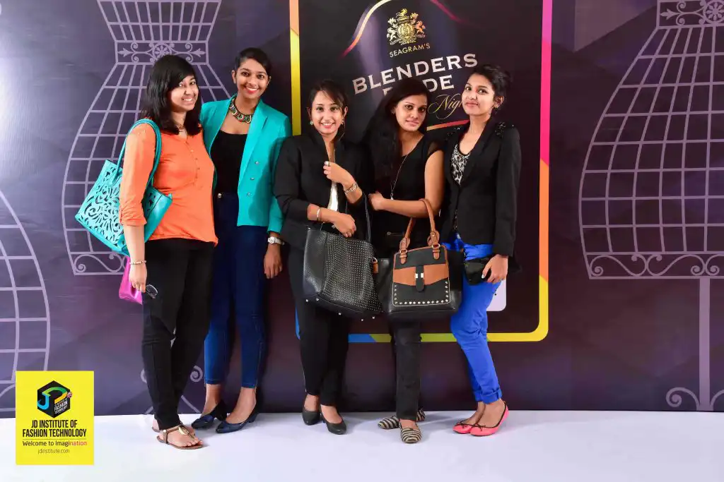STUDENTS STRIKE A POSE FOR THE SHUTTERBUGS AT THE EVENT