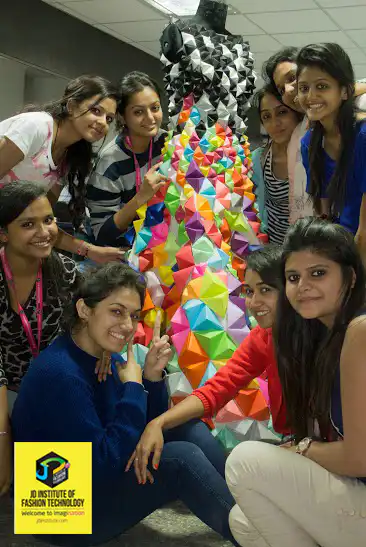 JD FASHION DESIGN STUDENTS STAND PROUD AGAINST THEIR INSTALLATION
