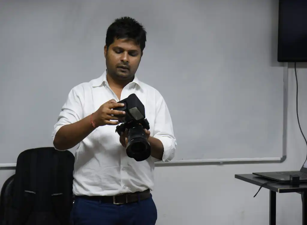 Photography students learning about new inventions